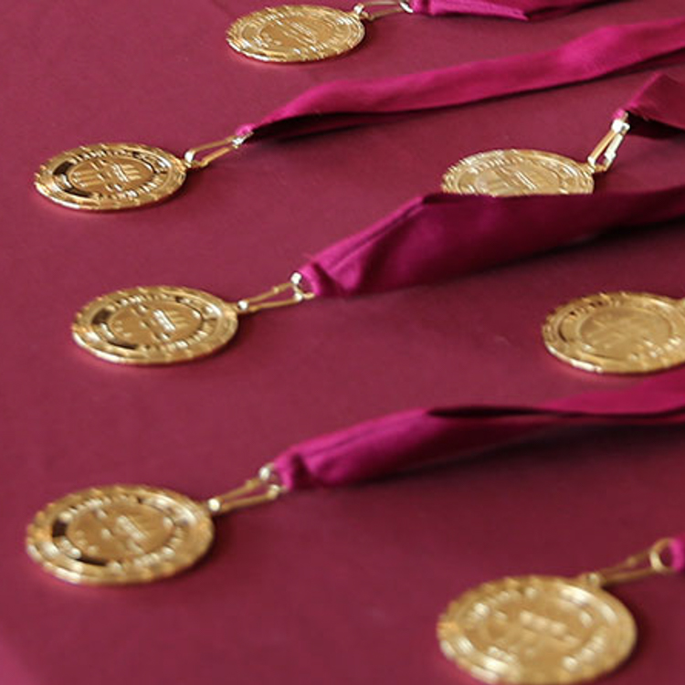 Honors Medallions on garnet tablecloth - Place holder for missing image for Outstanding Senior Scholar Spring 2021
