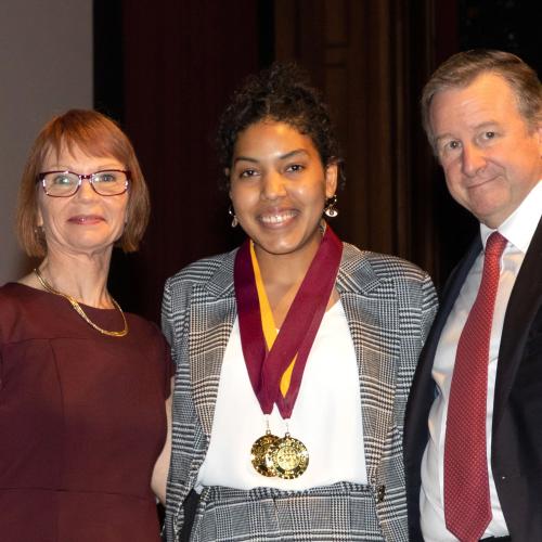 "Kiersten Wright, Outstanding Senior Scholar featured in the middle. On the left-Dr. Annette Schwabe, Honors Director; on the right-FSU President Richard McCullough."