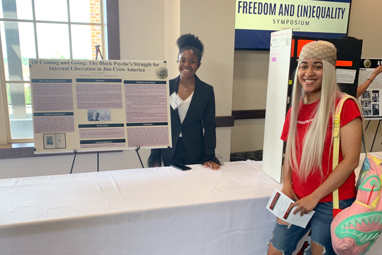 Fall 2019 HEP Symposium-2 students-The Black Psyche's Struggle for Internal Liberation in Jim Crow America table